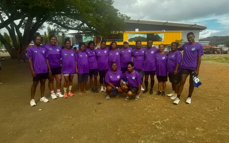 The PIN JETS Mixed Netball Team, proudly wearing their purple uniforms sponsored by Pay It Now PNG Limited.