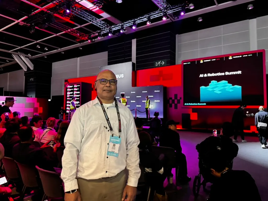 Pay It Now PNG’s Director Maurice at the AI & Robotics Summit stage, Consensus Hong Kong 2026, Hong Kong Convention and Exhibition Centre.